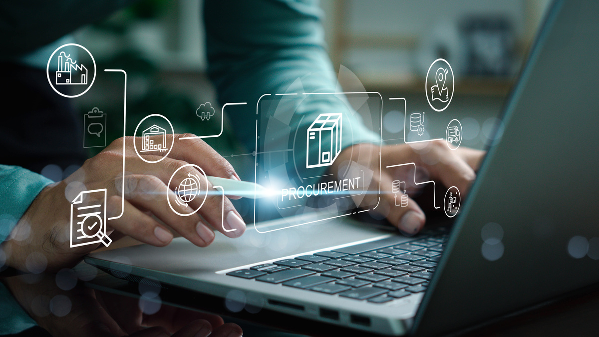 B2B industrial buyer conducting independent supplier research on multiple screens before contacting sales